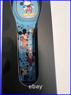 Disney Mickey Mouse Magic Band+ Through The Years Music. Rare Find