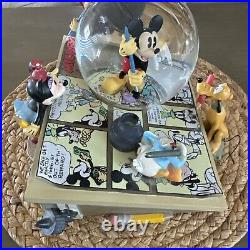 Disney Mickey Mouse in the Comics Snow Globe Flash Works Music Works Read