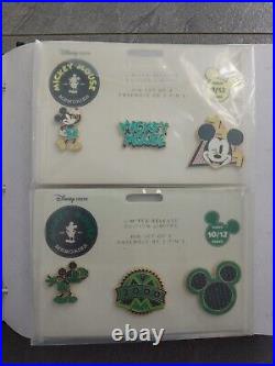 Disney Store Mickey Mouse Memories Pin Set in Collectors Binder